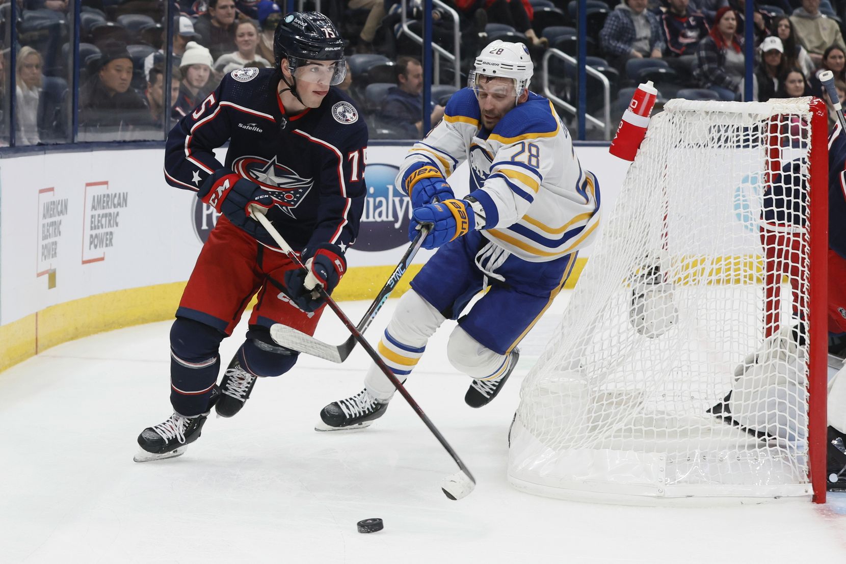 Columbus Blue Jackets' Tim Berni, left, is defended by Buffalo Sabres' Zemgus Girgensons during the third period of an NHL hockey game on Wednesday, Dec. 7, 2022, in Columbus, Ohio. (AP Photo/Jay LaPrete)nTim Berni,Zemgus Girgensons
