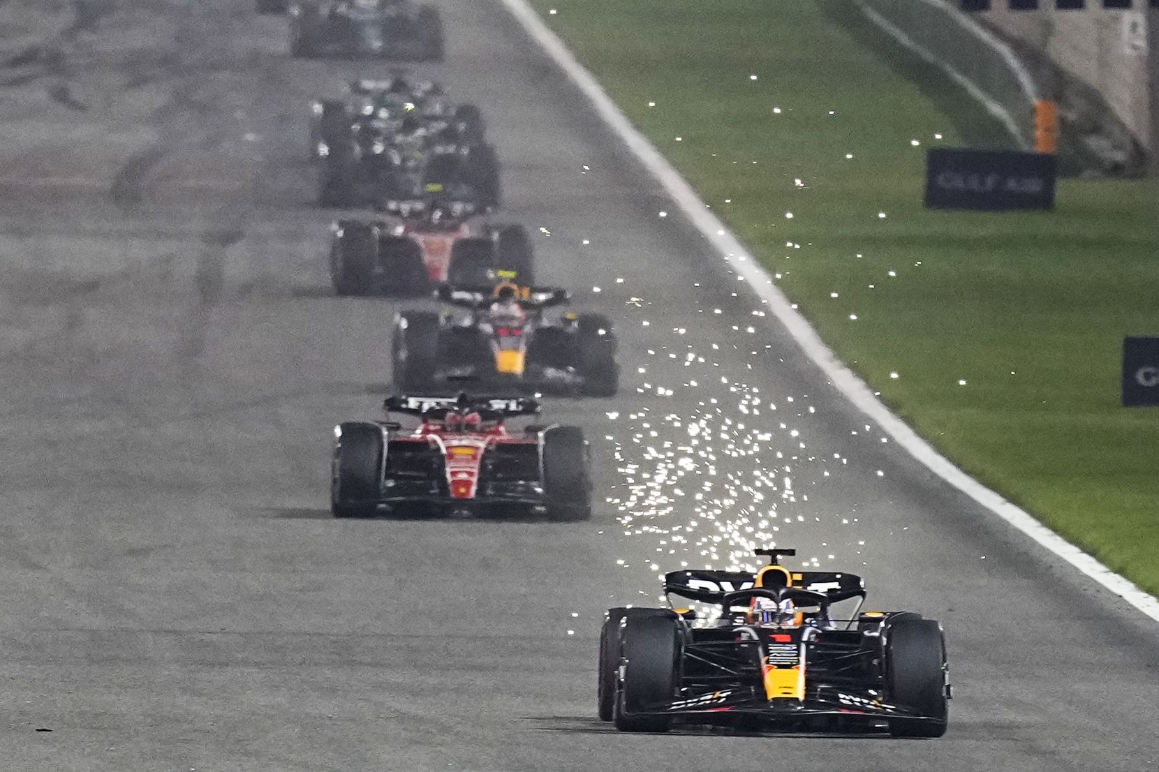 Red Bull driver Max Verstappen of the Netherlands leads at the start of the Formula One Bahrain Grand Prix at Sakhir circuit, Sunday, March 5, 2023. (AP Photo/Ariel Schalit)