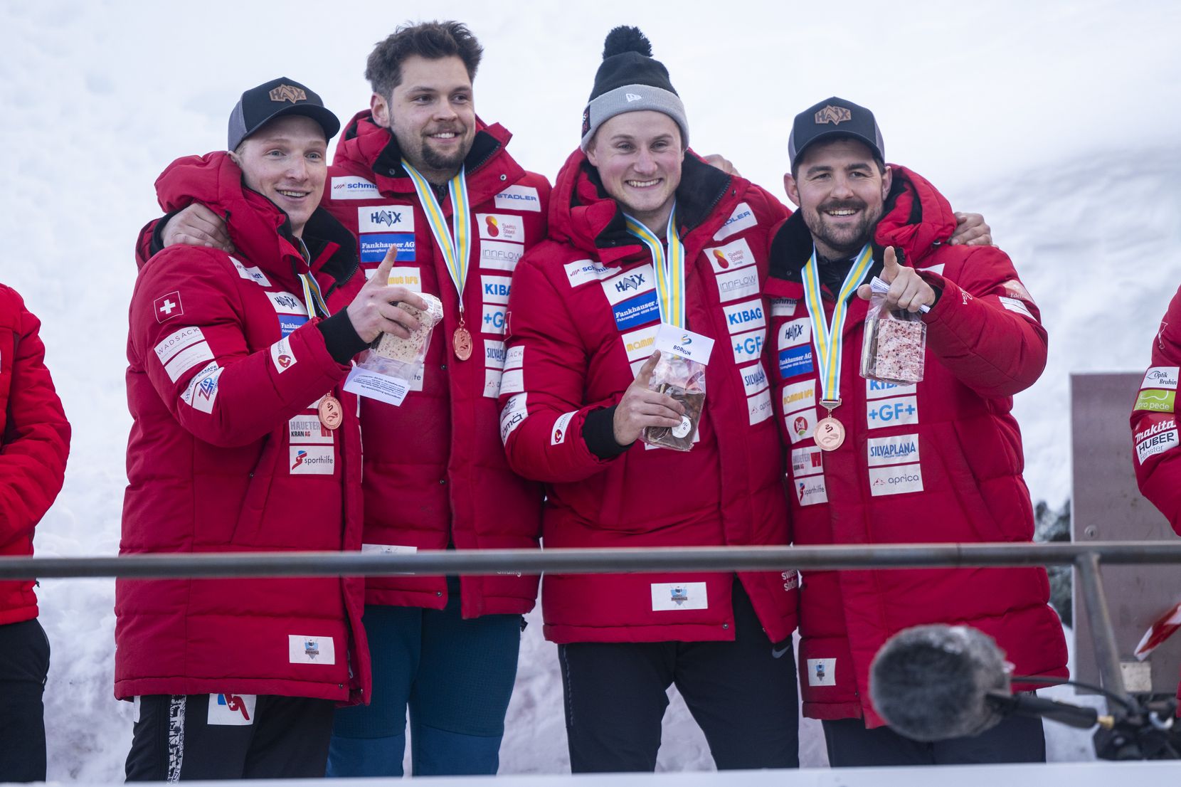 Simon Friedli and Team of Switzerland pose on the podium after the Men?s 4-Bob World Cup in St. Moritz, Switzerland, on Sunday, January 14, 2024. (KEYSTONE/Mayk Wendt)