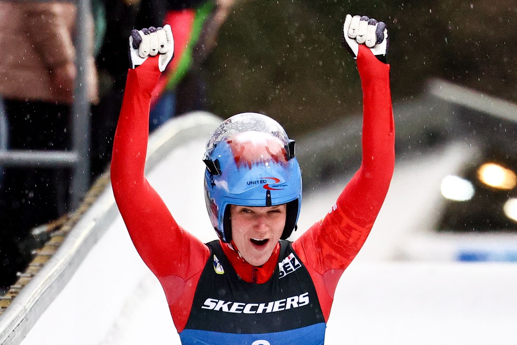 epa11105975 Natalie Maag of Switzerland celebrates her second place in the Sprint Women's Singles Final at the FIL Luge World Championships in Altenberg, Germany, 26 January 2024.  EPA/FILIP SINGER